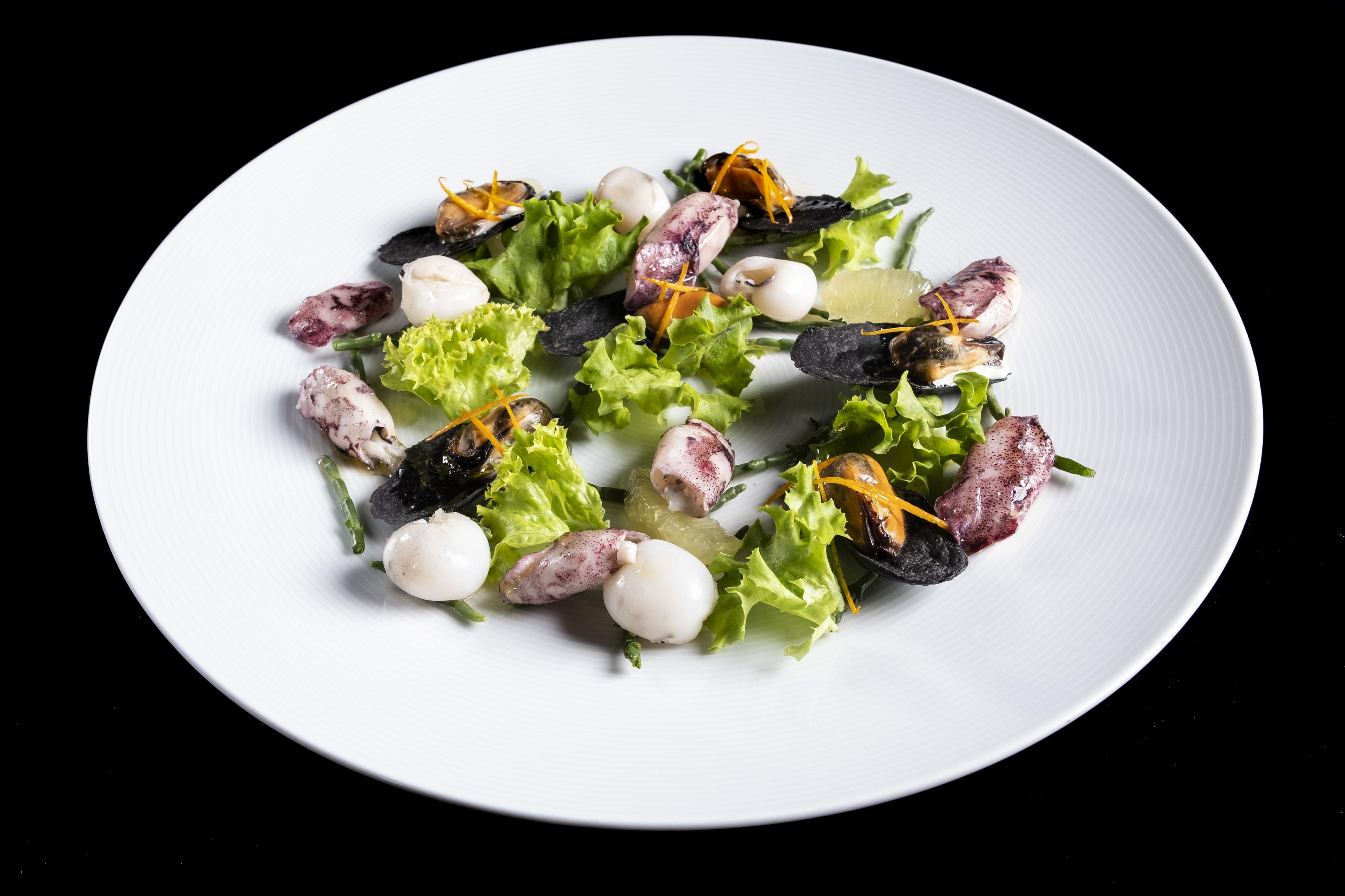 Grand Hotel Campione Campione d'Italia Exterior photo A salad of cuttlefish, octopus, and scallops
